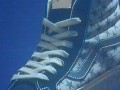 https-__hypebeast.com_image_2022_08_bianca-chandon-vans-og-sk8-hi-black-authentic-blue-distressed-skateboarding-release-info-10