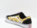 Vans-x-TC-Surf-Designs-Style-36-Black-Yellow-White-Skate-Shoes-_316703-back-US
